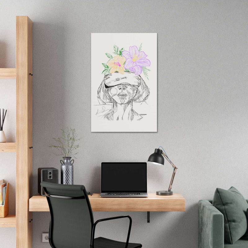 Modern home office setup with a chic wall art piece featuring a sketch of a woman with colorful flowers.