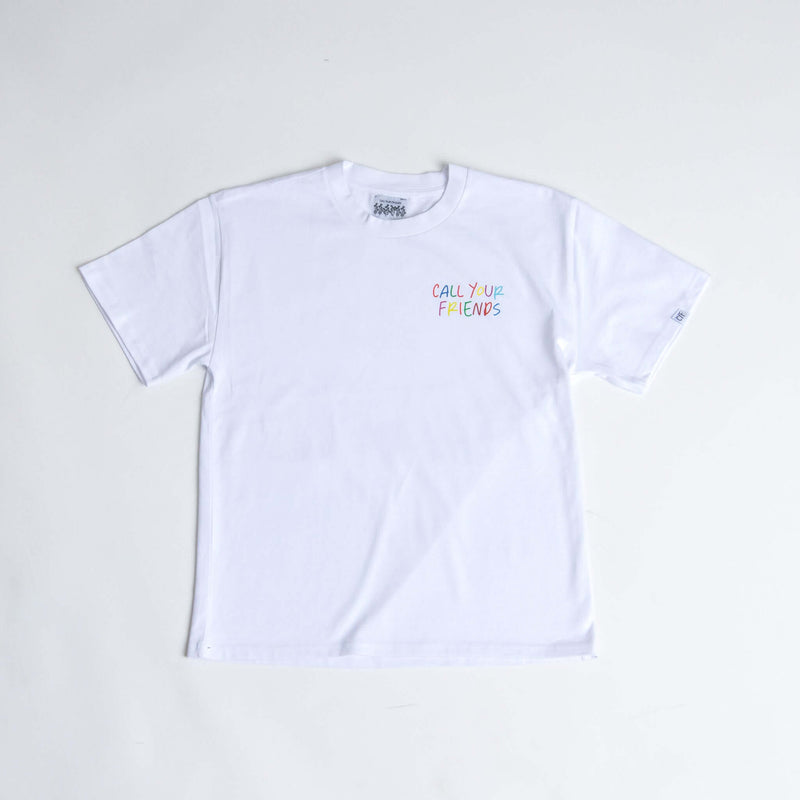 White Cereal Tee by Call Your Friends, made from 100% organic cotton, showcasing a colorful logo print. Sustainable, soft, and durable t-shirt.